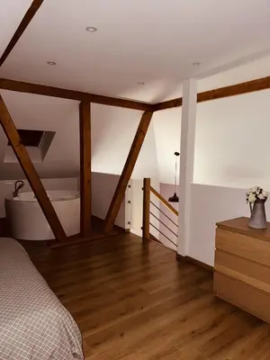 Un ou plusieurs lits dans un hébergement de l'établissement Gîte Cosy au cœur de l'Alsace