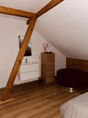 Un ou plusieurs lits dans un hébergement de l'établissement Gîte Cosy au cœur de l'Alsace