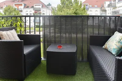 Coin salon dans l'établissement Le Chill&Chic Terrasse - Parking