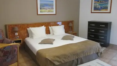 Un ou plusieurs lits dans un hébergement de l'établissement Hôtel sud alsace
