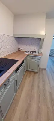Cuisine ou kitchenette dans l'établissement Maison de la colline de pam