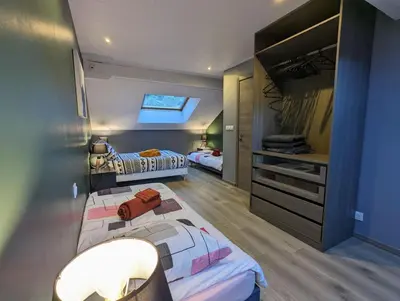 Un ou plusieurs lits dans un hébergement de l'établissement Maison Gite Le Bressaud