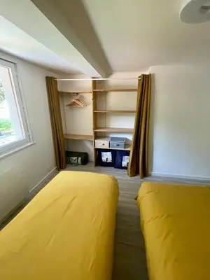 Un ou plusieurs lits dans un hébergement de l'établissement Chalet Le Cèdre Bleu 10 p - 10 min de Gérardmer