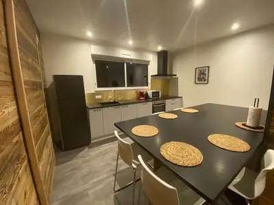 Cuisine ou kitchenette dans l'établissement Duplex le Corten, Terrasse et jardin