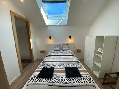 Un ou plusieurs lits dans un hébergement de l'établissement Duplex le Corten, Terrasse et jardin