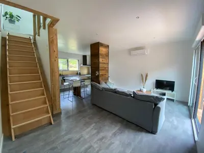Télévision ou salle de divertissement dans l'établissement Duplex le Corten, Terrasse et jardin