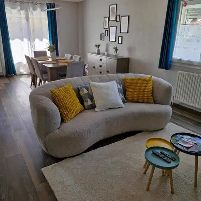 Coin salon dans l'établissement Maison de vacances