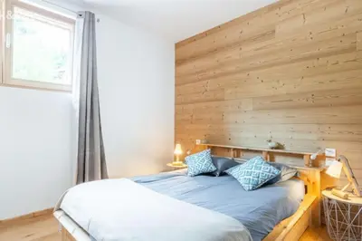 Un ou plusieurs lits dans un hébergement de l'établissement Appartement Maïnou à La Bresse