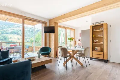 Coin salon dans l'établissement Appartement Maïnou à La Bresse