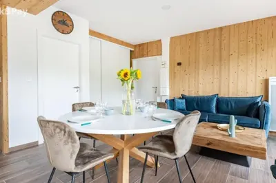 Coin salon dans l'établissement Appartement Maïnou à La Bresse