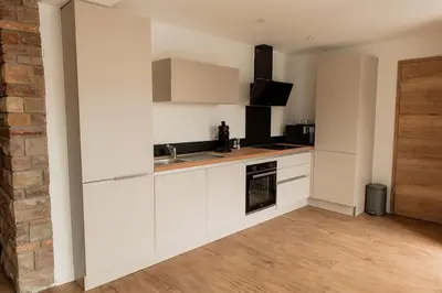 Cuisine ou kitchenette dans l'établissement Gîte Relais Terrasse