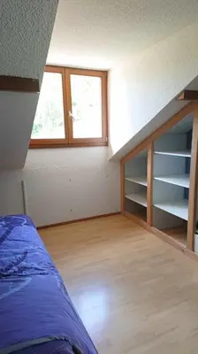 Un ou plusieurs lits dans un hébergement de l'établissement Charmante Maison Blanche