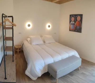 Un ou plusieurs lits dans un hébergement de l'établissement Alsace Chalet & Spa Meyer-Krumb