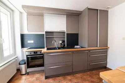 Cuisine ou kitchenette dans l'établissement Bleu des Vosges