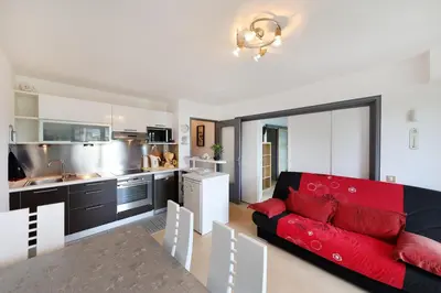Cuisine ou kitchenette dans l'établissement Les Xettes - Appartement vue montagne