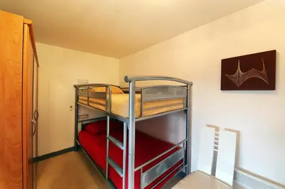 Un ou plusieurs lits dans un hébergement de l'établissement Les Xettes - Appartement vue montagne