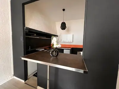 Cuisine ou kitchenette dans l'établissement Le Rosier