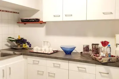 Cuisine ou kitchenette dans l'établissement Appartement F3 Petite Venise - Home Gallery