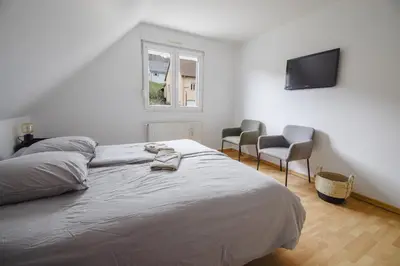 Un ou plusieurs lits dans un hébergement de l'établissement Vacances au Bonhomme