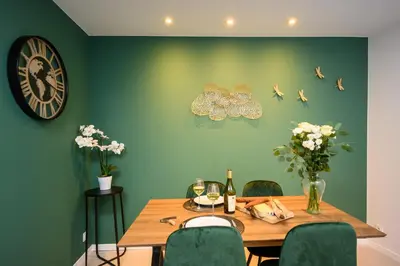 Coin salon dans l'établissement COZY F2 40m2 Appartement Climatisé Château