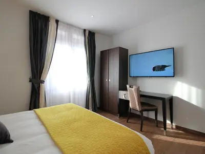 Télévision ou salle de divertissement dans l'établissement Gîte Alsacien : Terrasse, Sauna Privé, Accès Piscine et Bien-être, Proche Colmar et Route des Vins - FR-1-744-16