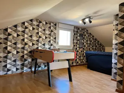 Coin salon dans l'établissement Chalet Marie-Louise - Gérardmer