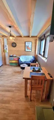 Un ou plusieurs lits dans un hébergement de l'établissement Studio type chalet