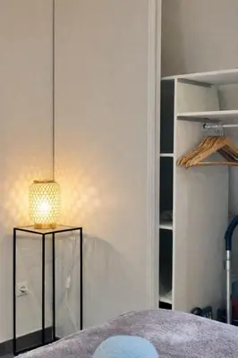 Un ou plusieurs lits dans un hébergement de l'établissement studio calme et cozy avec parking privé