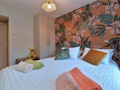 Un ou plusieurs lits dans un hébergement de l'établissement Charmant appartement rénové pour 4 pers avec terrasse à Hunawihr - FR-1-744-14