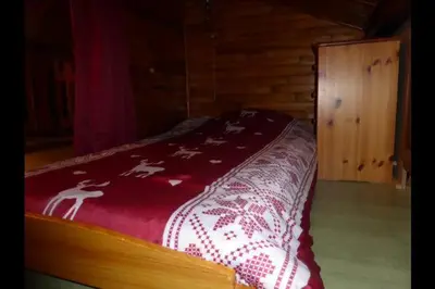 Un ou plusieurs lits dans un hébergement de l'établissement Chalet le Grand Tétras