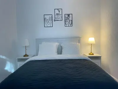 Un ou plusieurs lits dans un hébergement de l'établissement Appartement la petite Venise
