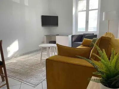 Télévision ou salle de divertissement dans l'établissement Cocooning