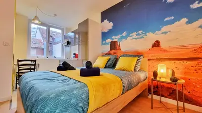 Un ou plusieurs lits dans un hébergement de l'établissement La Résidence Évasion 1 - Original - Gare - Wifi - Relax BNB