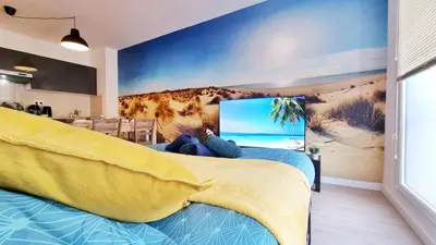 Télévision ou salle de divertissement dans l'établissement La Résidence Évasion 3 - Original - Gare - Wifi - Relax BNB