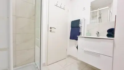 Salle de bains dans l'établissement La Résidence Évasion 3 - Original - Gare - Wifi - Relax BNB