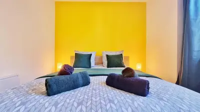 Un ou plusieurs lits dans un hébergement de l'établissement La Résidence Évasion 3 - Original - Gare - Wifi - Relax BNB