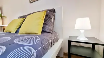 Un ou plusieurs lits dans un hébergement de l'établissement Chez JM - Calme - Chic - Fibre - Relax BNB
