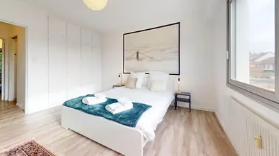 Un ou plusieurs lits dans un hébergement de l'établissement Appartement La Fecht + parking