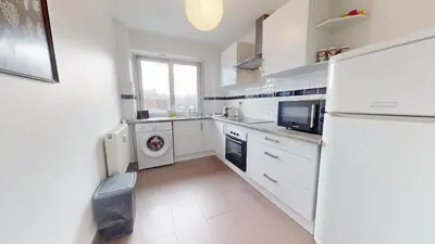 Cuisine ou kitchenette dans l'établissement Appartement La Fecht + parking