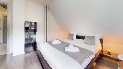 Un ou plusieurs lits dans un hébergement de l'établissement Chez Ludivine - Maison avec Terrasse et Parking