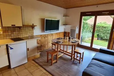 Cuisine ou kitchenette dans l'établissement Gîte Le Bressaud