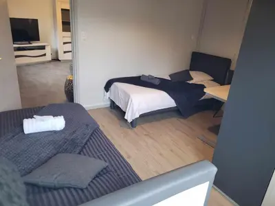 Un ou plusieurs lits dans un hébergement de l'établissement Appart6 Pers garage centre à 500m