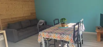 Coin salon dans l'établissement Magnifique appartement le marronnier