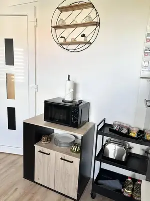 Cuisine ou kitchenette dans l'établissement Gîte le Lamala