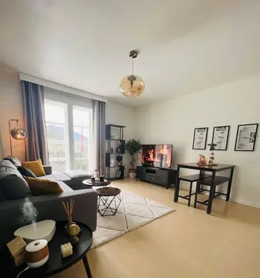 Coin salon dans l'établissement Paisible F2 Ensoleillé Vue Lac