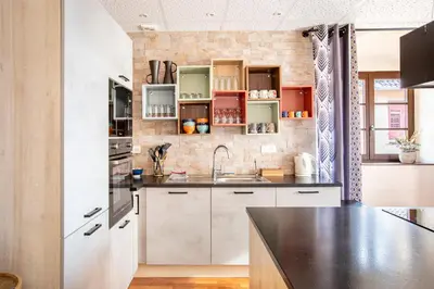 Cuisine ou kitchenette dans l'établissement Appartement 12 personnes 4 suite privatives 160 m2 terrasse