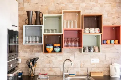 Cuisine ou kitchenette dans l'établissement Appartement 12 personnes 4 suite privatives 160 m2 terrasse