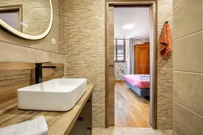 Salle de bains dans l'établissement Appartement 12 personnes 4 suite privatives 160 m2 terrasse
