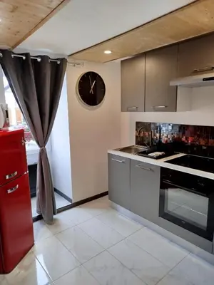 Cuisine ou kitchenette dans l'établissement Les Souvenirs d'Alsace