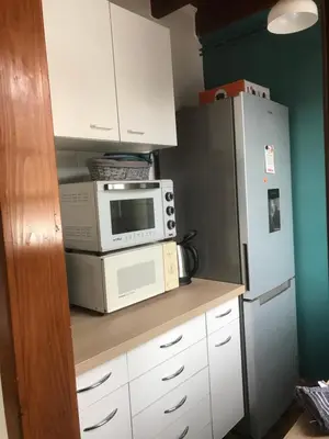 Cuisine ou kitchenette dans l'établissement Au p’tit paradis